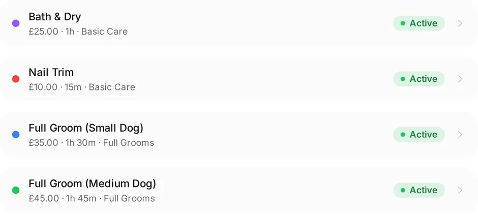 The services list at Pampered Paws: Bath & dry, £25, 1h, Basic Care; Nail trim, £10, 15m, Basic Care; Full groom (small dog), £35, 1h 30m, Full Grooms; Full groom (medium dog), £45, 1h 45m, Full Grooms
