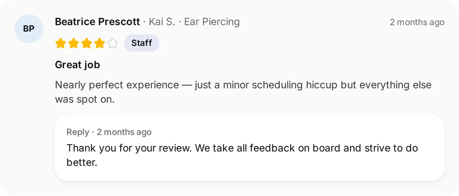 A review of Steel & Stone Piercings for ear piercing, headed "Great job", with the owner's reply underneath